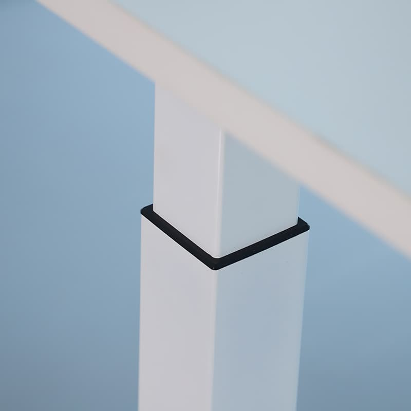 A detailed view of the white 2B2 adjustable standing desk frame from above, showing the motor box and cable connection for one of the legs, against a white background.