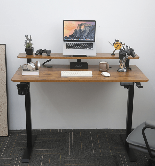 A two-tier vintage-style electric standing desk in a home office setting, featuring a laptop on the top shelf and a keyboard below, showcasing its practical and stylish design.