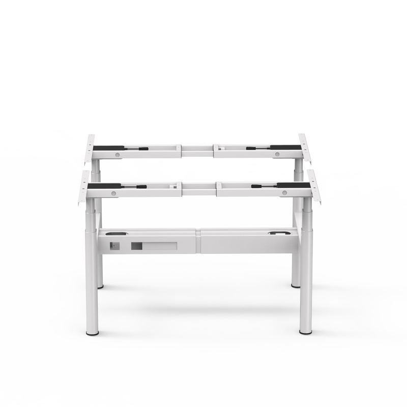 Front view of the white 4CF3A back-to-back sit-stand desk frame, showcasing its symmetrical 4-leg structure and central cable management channel.