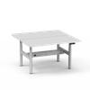 Modern 4CF3A back-to-back electric adjustable desk featuring clean white desktops, a grey 4-leg frame, and a visible control panel.