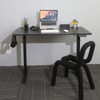 The versatile SACR2 sit-stand Gaming Setup desk as a centerpiece of stylish home office furniture, shown with a modern chair and a complete computer setup.