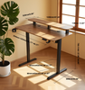 A detailed diagram of the two-tier standing desk with all dimensions in millimeters and inches, including the height range, desktop width, and base measurements.