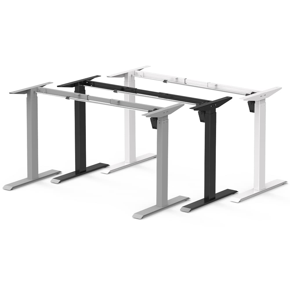 A 2SAB2(F) electric standing desk is shown in a bright, modern home office environment with a light wood desktop and black frame.