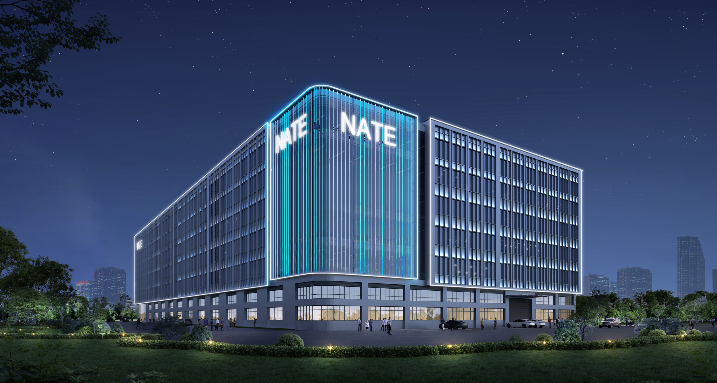 NATE smart factory night rendering with illuminated facade