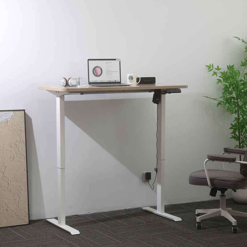 Ergonomic home office workspace featuring 2SABRF2(A) adjustable standing desk frame with laptop and accessories.